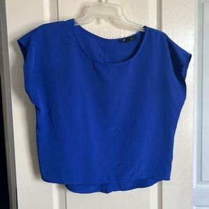 Blue size small forever 21 sleeveless blouse.